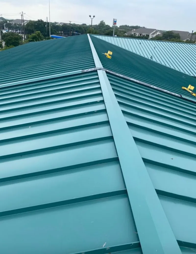 Green commercial metal roof ridge and valley for Metal Roof Repair in Port Clinton